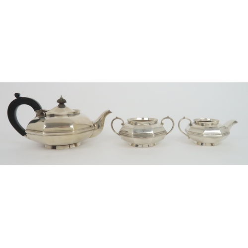 902 - A THREE PIECE SILVER TEA SERVICE