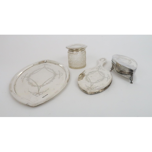 908 - A FOUR PIECE SILVER DRESSING TABLE SET