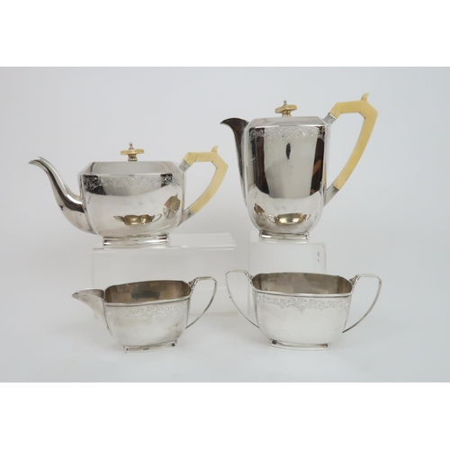 909 - AN ART DECO SILVER FOUR PIECE TEA SERVICE