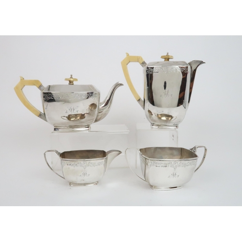 909 - AN ART DECO SILVER FOUR PIECE TEA SERVICE