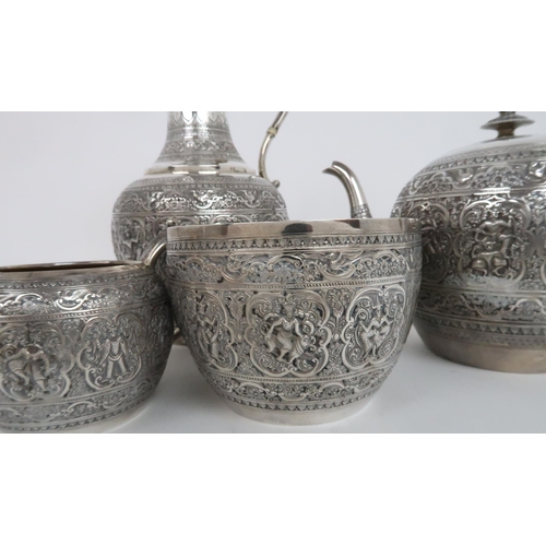 910 - A FOUR PIECE SILVER TEA SERVICE