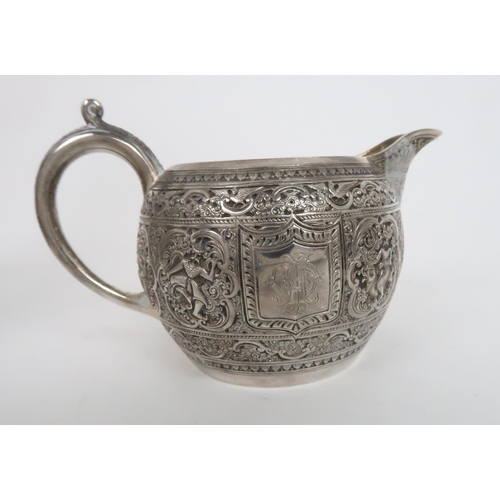 910 - A FOUR PIECE SILVER TEA SERVICE