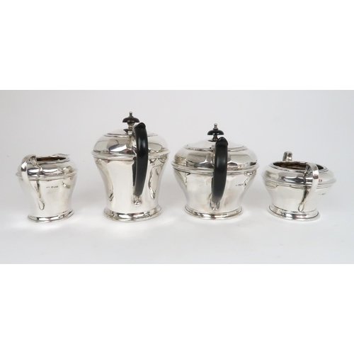 915 - A FOUR PIECE SILVER TEA SERVICE