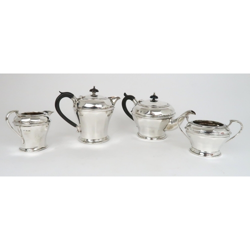 915 - A FOUR PIECE SILVER TEA SERVICE