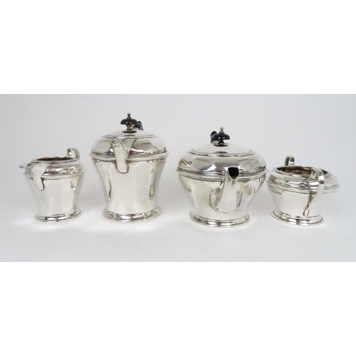 915 - A FOUR PIECE SILVER TEA SERVICE