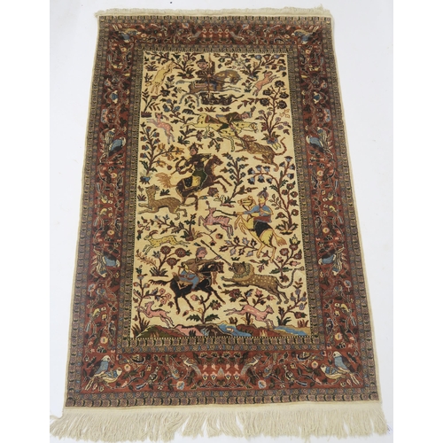 102 - AN EASTERN SILK CREAM GROUND RUG DEPICTING A HUNTING SCENE