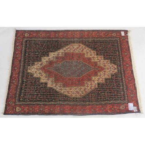 103 - A BLACK GROUND SENNEH RUG