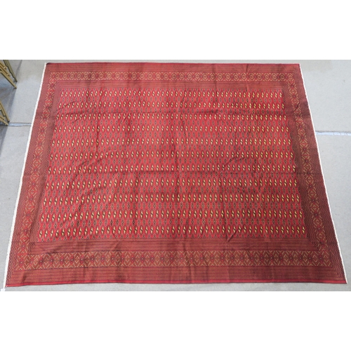 104 - A RED GROUND TURKMAN RUG