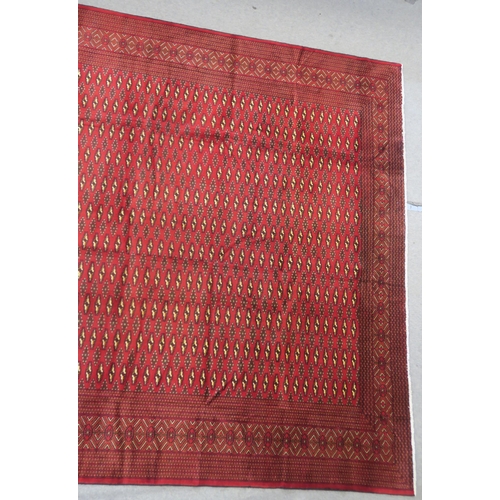 104 - A RED GROUND TURKMAN RUG