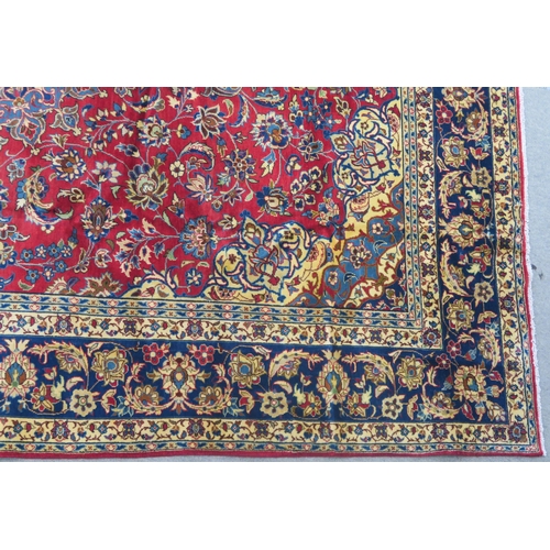 105 - A RED GROUND NAJAF ABAD RUG