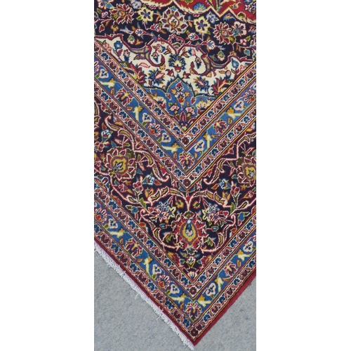 108 - A RED GROUND FINE KESHAN RUG