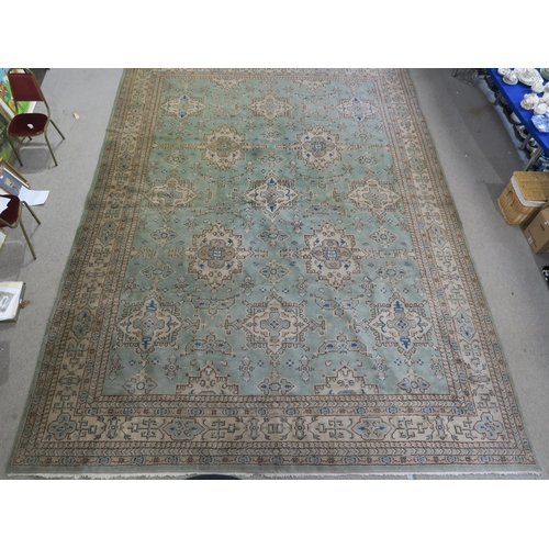 110 - LARGE GREEN GROUND EASTERN RUG