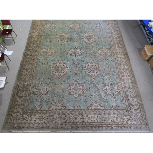 110 - LARGE GREEN GROUND EASTERN RUG