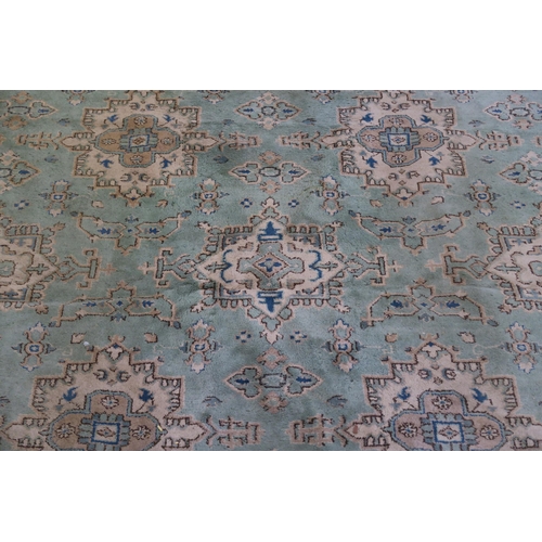 110 - LARGE GREEN GROUND EASTERN RUG