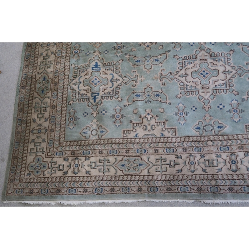 110 - LARGE GREEN GROUND EASTERN RUG