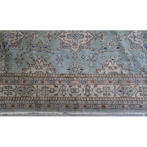 110 - LARGE GREEN GROUND EASTERN RUG