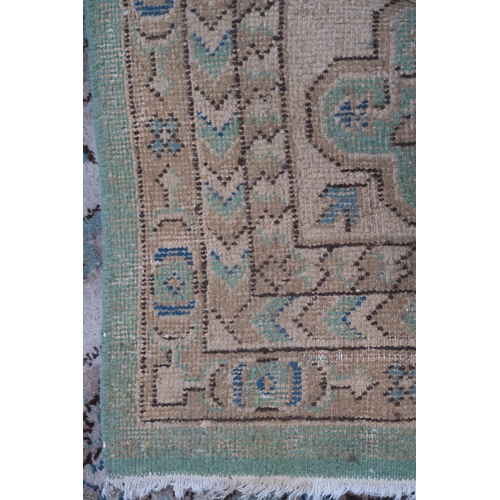 110 - LARGE GREEN GROUND EASTERN RUG