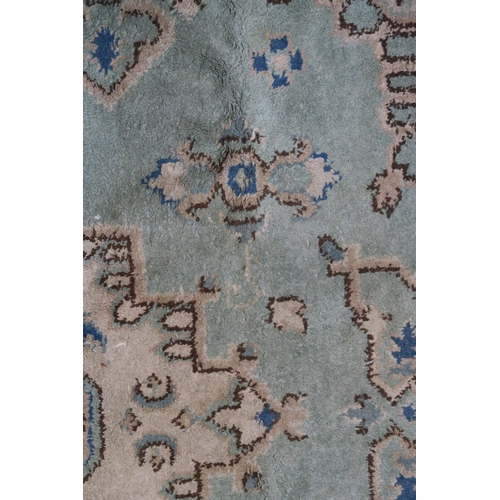 110 - LARGE GREEN GROUND EASTERN RUG