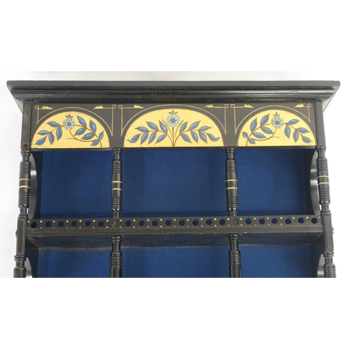 13 - AN AESTHETIC MOVEMENT EBONISED AND PAINTED HANGING CABINET