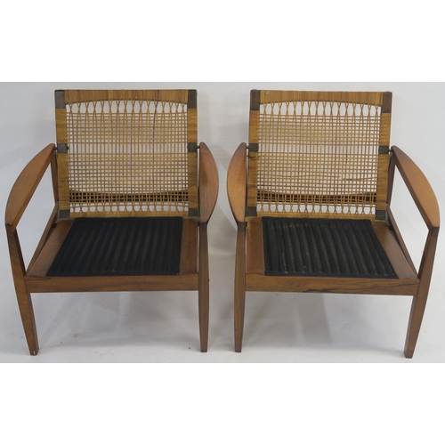 134 - A PAIR OF MID CENTURY ROSEWOOD CANE BACK ARMCHAIRS