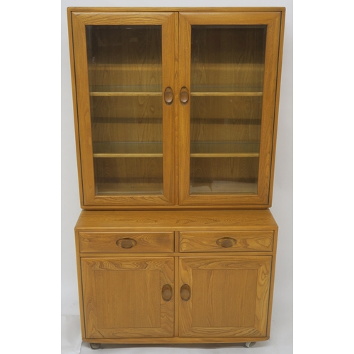 137 - AN ELM ERCOL 2149 DISPLAY CABINET ON CUPBOARD BASE