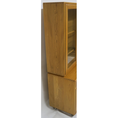 137 - AN ELM ERCOL 2149 DISPLAY CABINET ON CUPBOARD BASE