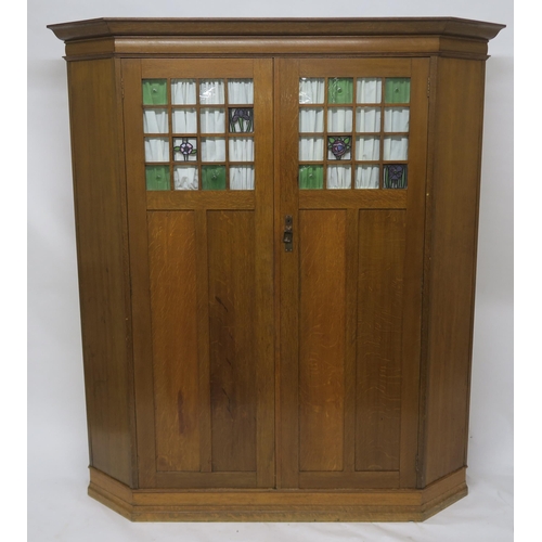 151 - AN OAK ARTS & CRAFTS WARDROBE IN THE MANNER OF GEORGE WALTON