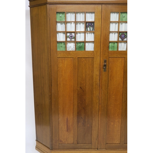 151 - AN OAK ARTS & CRAFTS WARDROBE IN THE MANNER OF GEORGE WALTON