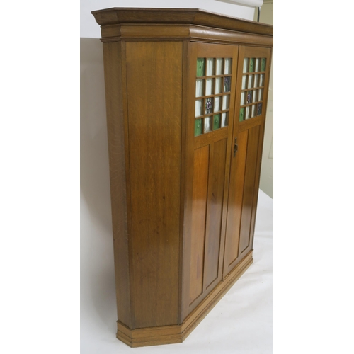 151 - AN OAK ARTS & CRAFTS WARDROBE IN THE MANNER OF GEORGE WALTON