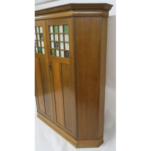 151 - AN OAK ARTS & CRAFTS WARDROBE IN THE MANNER OF GEORGE WALTON