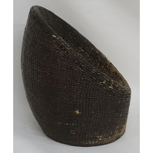 152 - A MID 20TH CENTURY RATTAN SEAT IN THE MANNER OF EERO AARNIO