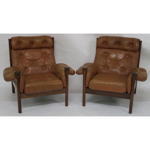 154 - A PAIR OF MID 20TH CENTURY GUY ROGERS FOR HEALS SANTA FE BUTTON BACK TAN LEATHER ARMCHAIRS