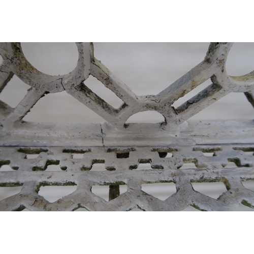 42 - A 19TH CENTURY WHITE PAINTED CAST IRON GARDEN SEAT