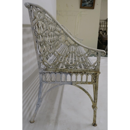 42 - A 19TH CENTURY WHITE PAINTED CAST IRON GARDEN SEAT