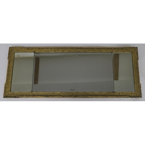 63 - A GEORGIAN GILTWOOD TRIPLE PLATE WALL MIRROR