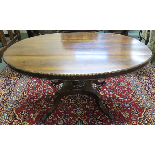 66A - A GEORGE IV ROSEWOOD OVAL BREAKFAST TABLE