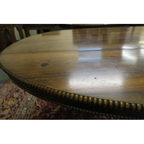 66A - A GEORGE IV ROSEWOOD OVAL BREAKFAST TABLE