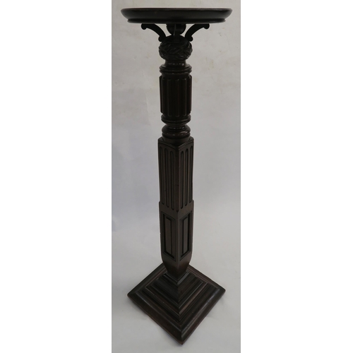 70 - AN EARLY 20TH CENTURY WALNUT TUSCAN COLUMN PEDESTAL