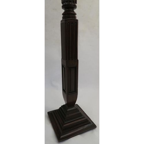 70 - AN EARLY 20TH CENTURY WALNUT TUSCAN COLUMN PEDESTAL