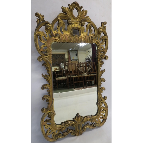 74 - A GEORGIAN DESIGN ROCOCO STYLE GILT MIRROR