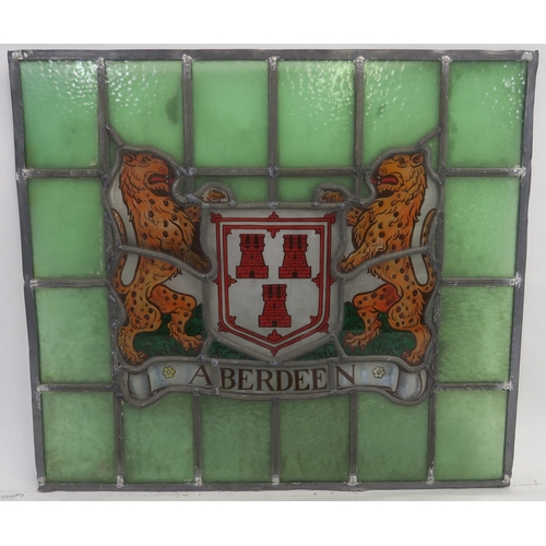 75 - A LEADED AND STAINED GLASS PANEL