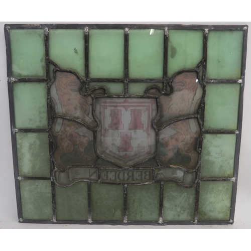 75 - A LEADED AND STAINED GLASS PANEL