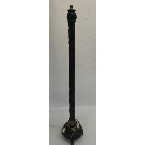 79 - A CHINESE CARVED AND STAINED WOOD STANDARD LAMP