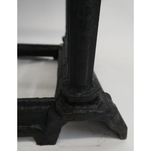 82 - A PAIR OF VICTORIAN CAST IRON UMBRELLA STANDS