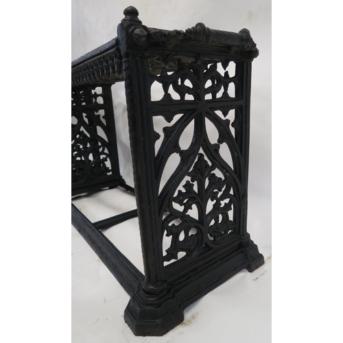 82 - A PAIR OF VICTORIAN CAST IRON UMBRELLA STANDS