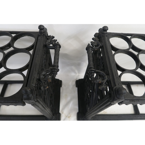 82 - A PAIR OF VICTORIAN CAST IRON UMBRELLA STANDS