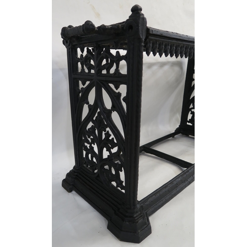 82 - A PAIR OF VICTORIAN CAST IRON UMBRELLA STANDS