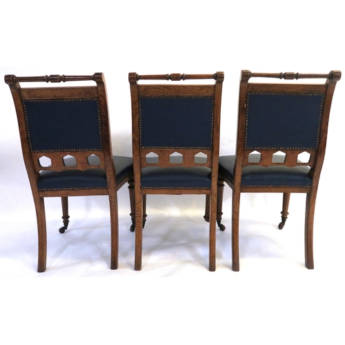 84 - A SET OF FIVE ARTS AND CRAFTS OAK DINING CHAIRS