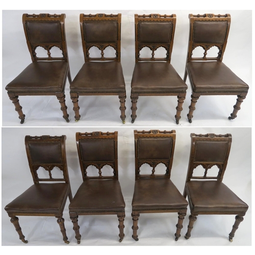 85 - A SET OF EIGHT PUGINESQUE OAK DINING CHAIRS