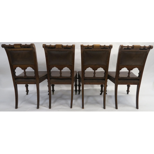 85 - A SET OF EIGHT PUGINESQUE OAK DINING CHAIRS